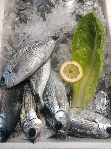 Ιχθυοπωλείο "ο Σαρωνικός" - Γαστρονομία και φιλοξενία