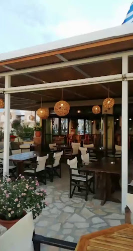 Opinii despre aplo beach bar cafe în Μαστιχάρι - Γαστρονομία και φιλοξενία