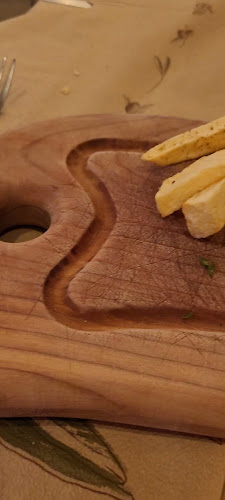 Opinii despre ΘΑΣΙΩΝ ΣΥΜΠΟΣΙΟ-THASSIAN SYMPOSIUM în Λιμενάρια - Γαστρονομία και φιλοξενία