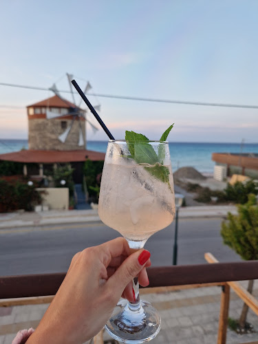 Opinii despre Kompologaki Rooftop Restaurant-MezzeBar în Ιαλυσός - Γαστρονομία και φιλοξενία