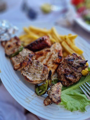 Ταβέρνα Συμπόσιο - Γαστρονομία και φιλοξενία