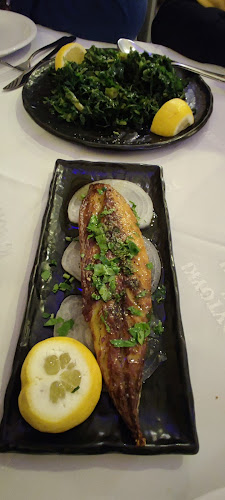 Ουζερί του Καβούρη - Γαστρονομία και φιλοξενία