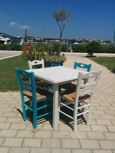 Το Ουζάκι - Γαστρονομία και φιλοξενία