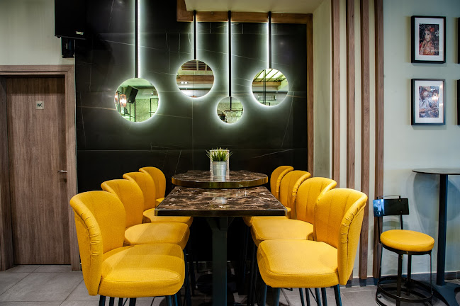 Cafe-Bar "Status" - Γαστρονομία και φιλοξενία