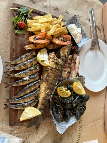 Opinii despre ΘΑΣΙΩΝ ΣΥΜΠΟΣΙΟ-THASSIAN SYMPOSIUM în Λιμενάρια - Γαστρονομία και φιλοξενία