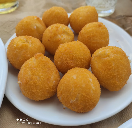 Opinii despre Ταβέρνα "Παραλία" în Λουτρά Ωραίας Ελένης - Γαστρονομία και φιλοξενία