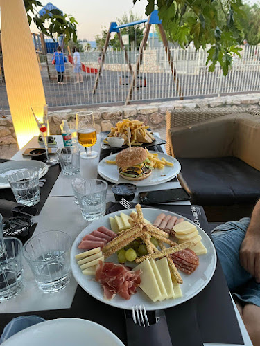 Θέα Δηλαβέρη - Μεταμόρφωση