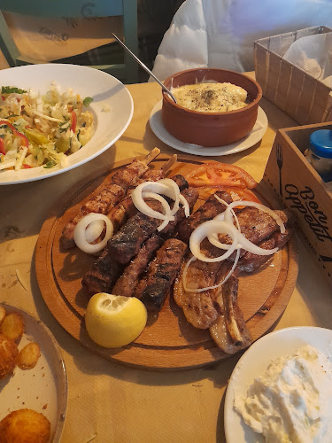 Σουβλάκι-Μπάρ "Ο καλλιτέχνης" - Κορινός