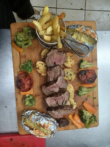 Opinii despre Skorpios Restaurant în Κάτω Γούβες - Γαστρονομία και φιλοξενία