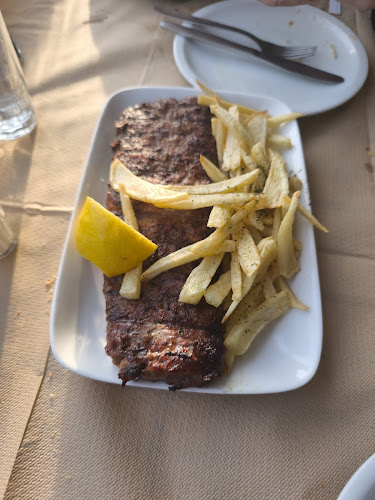 Opinii despre Taverna Vasilis Restaurant în Πόρτο Ράφτη - Γαστρονομία και φιλοξενία